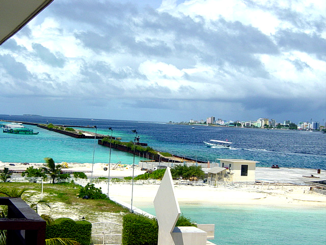 InternetHolidaysBiz Airport Transit hotels Hulhule island airport hotel Male International airport Maldives view of Male from suite bedroom